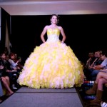 Quinceanera dresses in gold, red, and yellow
