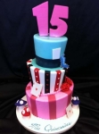 topsy turvy quinceanera cake.jpg